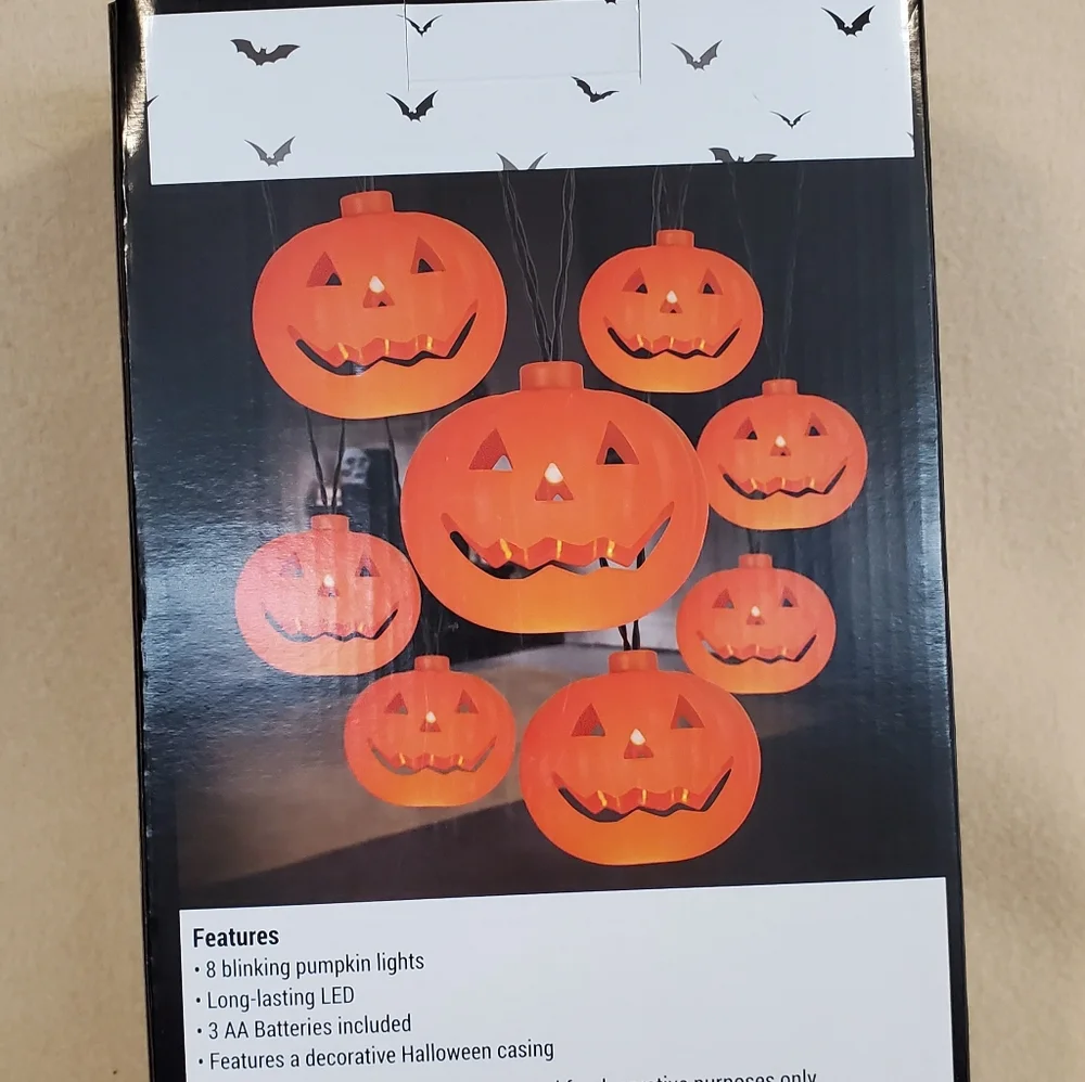 String of 8 halloween battery operated led orange blinking pumpkin lights